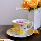 Arita Ware Artist Yellow Coffee Cup with Yellow Flower